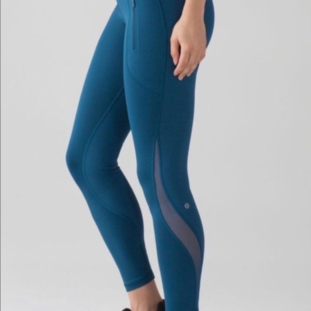 Lululemon Navy Blue Leggings with mesh and zip pockets